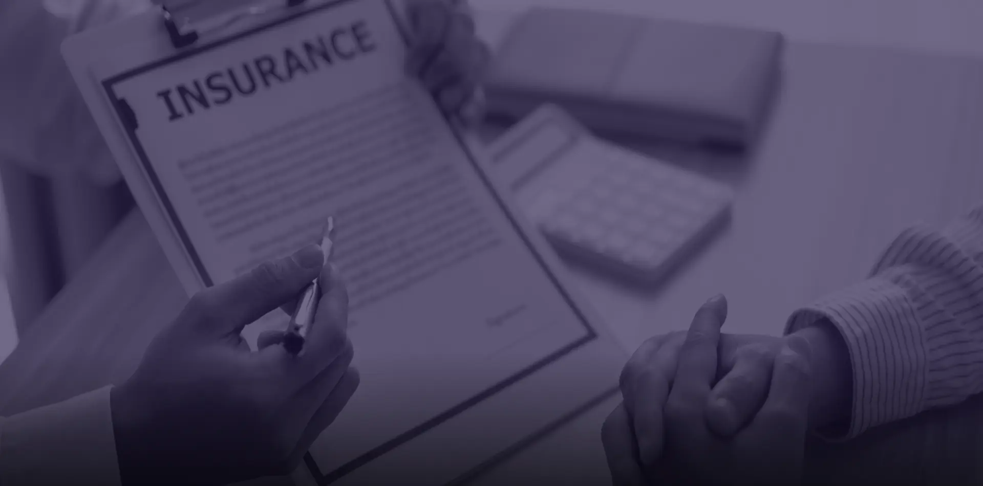 Insurance professionals managing digital policy applications and client documents